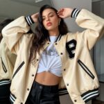 a-stylish-young-woman-standing-indoors-n_G_0GxXxfTXSiq1EqSmOJKA_iKQ-Y713TaW4rwjP4MVUFg